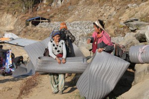 Beneficiaries taking away relief packages to villages