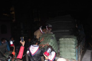 Loading relief packages at 3 am in the morning 2