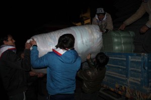 Loading relief packages at 3 am in the morning