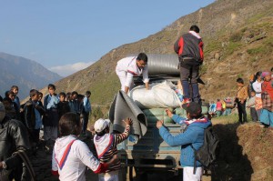 Sai Youth unloading the relief packages 2