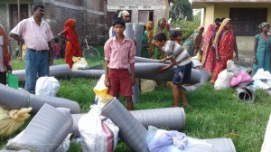 6k.Victims with relief materials   