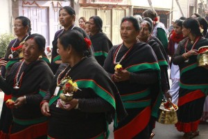 Ladies  dressed in local dress in the procession     