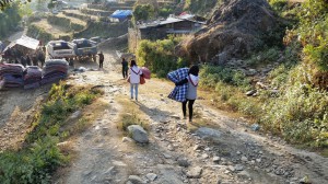 Sai Youth Carrying Blankets and Matresses to give away to beneficiaries